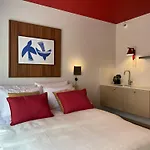 Ironique Apartments